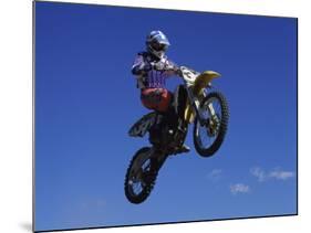 Airborne Motorcyclist-null-Mounted Photographic Print