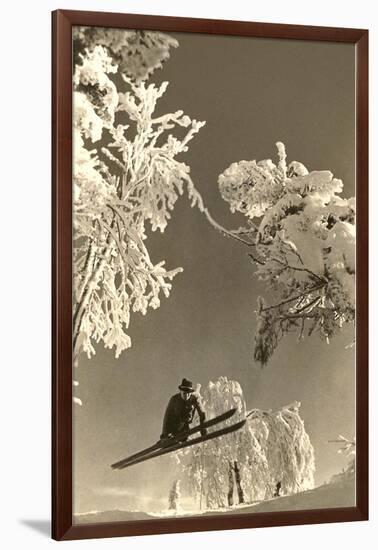 Airborne Skier Amid Frost-Laden Trees-null-Framed Art Print