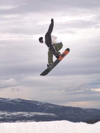 Airborne Snowboarder