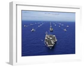 Aircraft Carrier USS Ronald Reagan Transits the Pacific Ocean with a Fleet of Ships-Stocktrek Images-Framed Premium Photographic Print