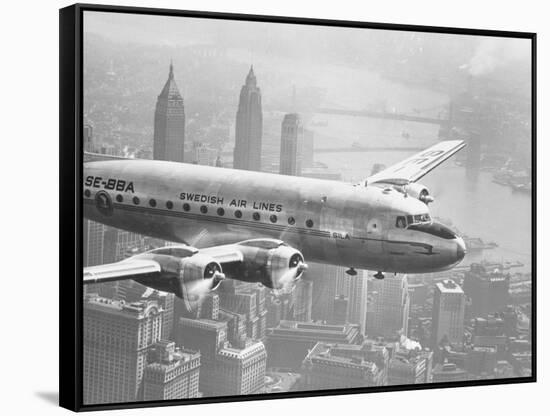 Aircraft Flying over City-null-Framed Stretched Canvas