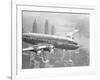 Aircraft Flying over City-null-Framed Photographic Print