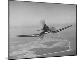 Aircraft Flying Straight On-Dmitri Kessel-Mounted Photographic Print