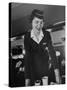 Airline Stewardess Seving Coffee-Peter Stackpole-Stretched Canvas