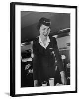 Airline Stewardess Seving Coffee-Peter Stackpole-Framed Photographic Print