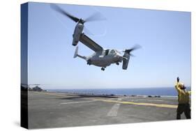 Airman Directs the Take-Off an MV-22 Osprey-null-Stretched Canvas