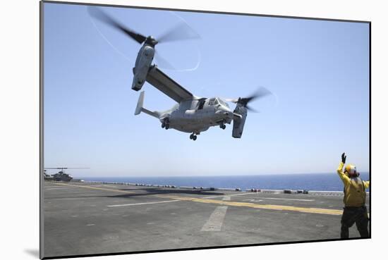Airman Directs the Take-Off an MV-22 Osprey-null-Mounted Photographic Print