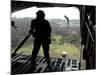 Airman Watches a Practice Bundle Fall from a C-17 Globemaster Iii-Stocktrek Images-Mounted Photographic Print