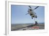 Airmen Attach a Cargo Hook to an SA-330J Puma Helicopter-null-Framed Photographic Print