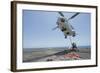 Airmen Attach a Cargo Hook to an SA-330J Puma Helicopter-null-Framed Photographic Print