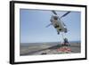 Airmen Attach a Cargo Hook to an SA-330J Puma Helicopter-null-Framed Photographic Print