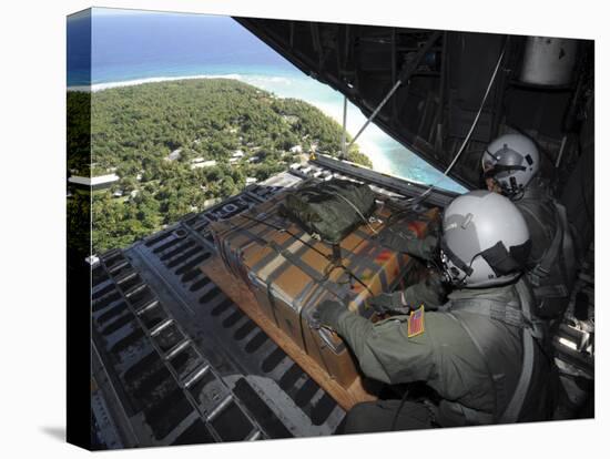 Airmen Push Out a Pallet of Donated Goods over the Island of Yap from C-130 Hercules, Dec 19, 2008-Stocktrek Images-Stretched Canvas