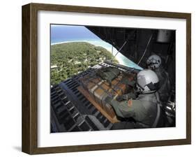 Airmen Push Out a Pallet of Donated Goods over the Island of Yap from C-130 Hercules, Dec 19, 2008-Stocktrek Images-Framed Photographic Print