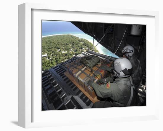 Airmen Push Out a Pallet of Donated Goods over the Island of Yap from C-130 Hercules, Dec 19, 2008-Stocktrek Images-Framed Photographic Print