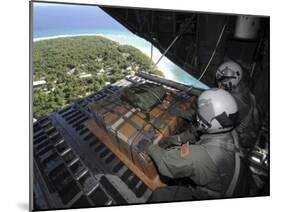 Airmen Push Out a Pallet of Donated Goods over the Island of Yap from C-130 Hercules, Dec 19, 2008-Stocktrek Images-Mounted Photographic Print