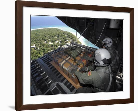 Airmen Push Out a Pallet of Donated Goods over the Island of Yap from C-130 Hercules, Dec 19, 2008-Stocktrek Images-Framed Photographic Print