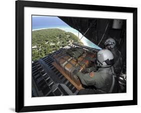 Airmen Push Out a Pallet of Donated Goods over the Island of Yap from C-130 Hercules, Dec 19, 2008-Stocktrek Images-Framed Photographic Print