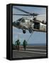 Airmen Run to Cover after Attaching Cargo Legs to an Mh-60S Sea Hawk-null-Framed Stretched Canvas