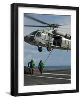 Airmen Run to Cover after Attaching Cargo Legs to an Mh-60S Sea Hawk-null-Framed Photographic Print