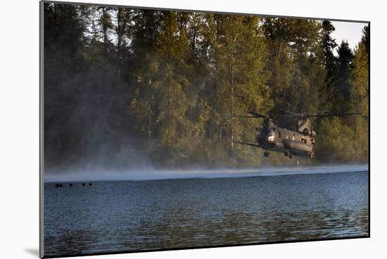 Airmen Wait in a Lake for an Mh-47 Chinook Helicopter to Extract Them-null-Mounted Photographic Print