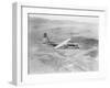 Airplane Flying over Landscape-null-Framed Photographic Print