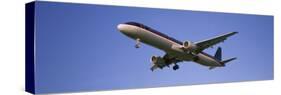 Airplane Flying-null-Stretched Canvas