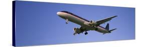 Airplane Flying-null-Stretched Canvas