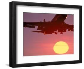 Airplane in Flight During Sunrise, Sunset-Mitch Diamond-Framed Photographic Print