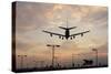 Airplane landing-Charles Bowman-Stretched Canvas