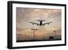 Airplane landing-Charles Bowman-Framed Photographic Print