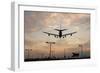 Airplane landing-Charles Bowman-Framed Photographic Print