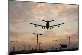 Airplane landing-Charles Bowman-Mounted Photographic Print