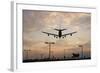 Airplane landing-Charles Bowman-Framed Photographic Print