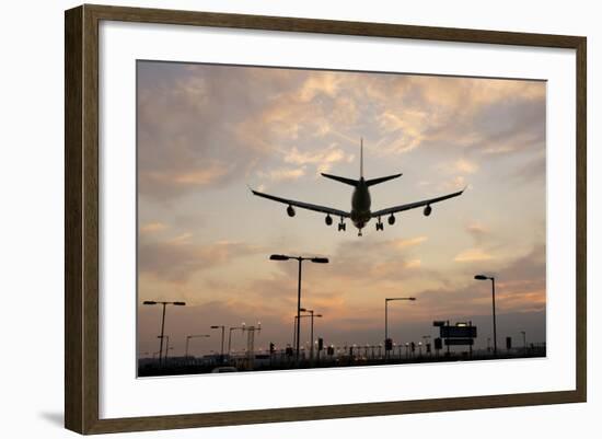 Airplane landing-Charles Bowman-Framed Photographic Print