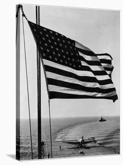 Airplane on Battleship Deck with American Flag in Foreground, World War II-null-Stretched Canvas