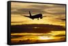 Airplane sunset-Charles Bowman-Framed Stretched Canvas