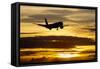Airplane sunset-Charles Bowman-Framed Stretched Canvas