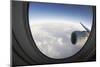 Airplane Window Looking Out on Cloudy Sky-Paul Souders-Mounted Photographic Print