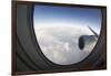 Airplane Window Looking Out on Cloudy Sky-Paul Souders-Framed Photographic Print