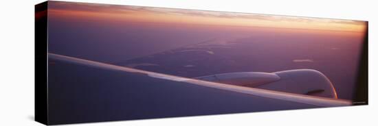 Airplane Wing at Dusk-null-Stretched Canvas