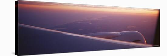 Airplane Wing at Dusk-null-Stretched Canvas