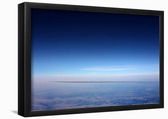 Airplane With Vapor Trail-null-Framed Poster