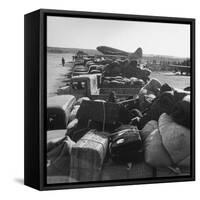 Airplanes Sitting on Airstrip at Airfield and Supplies Sitting in Trucks-Jack Birns-Framed Stretched Canvas