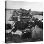 Airplanes Sitting on Airstrip at Airfield and Supplies Sitting in Trucks-Jack Birns-Stretched Canvas