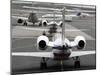 Airplanes Waiting to Take Off from Laguardia Airport, Carrying Travelers for Thanksgiving Holiday-null-Mounted Premium Photographic Print