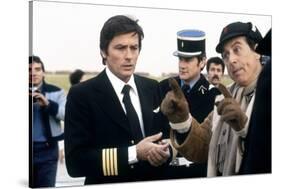 AIRPORT 80, 1978 directed by DAVID LOWELL RICH On the set, Alain Delon with David Lowell Rich (dire-null-Stretched Canvas