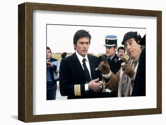 AIRPORT 80, 1978 directed by DAVID LOWELL RICH On the set, Alain Delon with David Lowell Rich (dire-null-Framed Photo