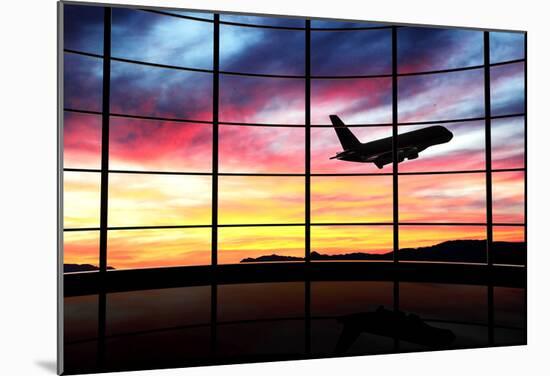 Airport Window With Airplane Flying At Sunset-viperagp-Mounted Poster