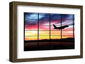 Airport Window with Airplane Flying at Sunset-viperagp-Framed Photographic Print