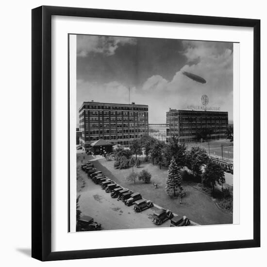 Airship over General Electric Building-null-Framed Premium Photographic Print